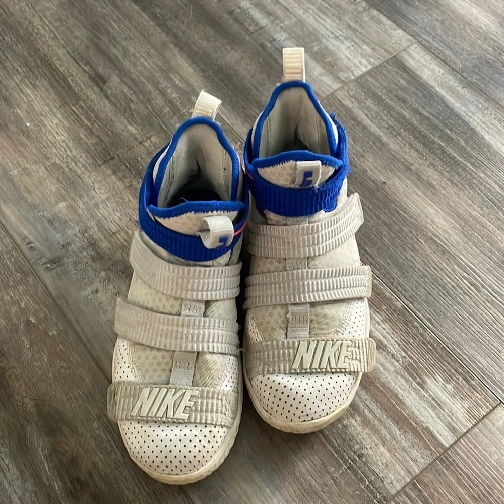 Nike tear preowned